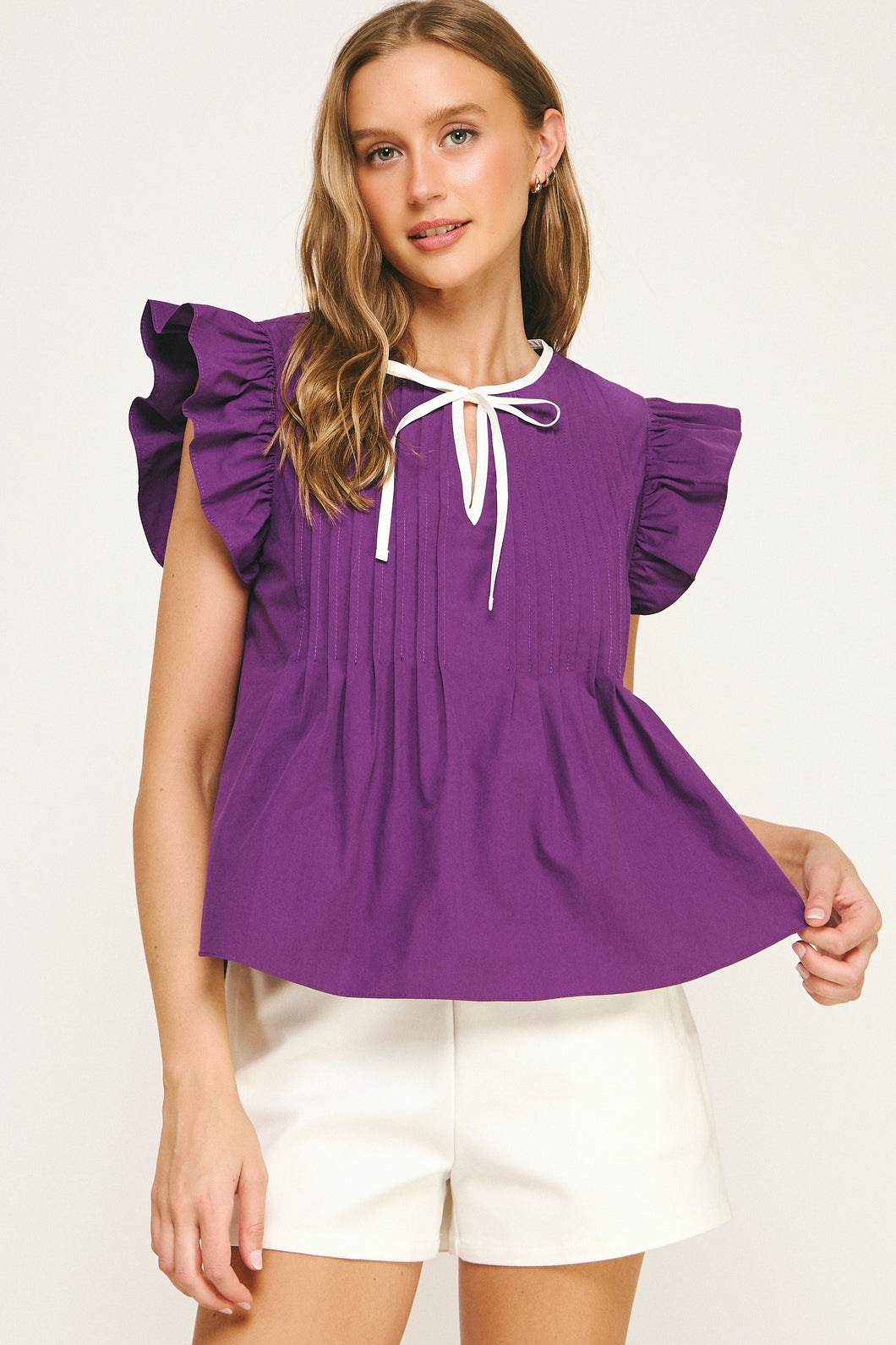 Contrasting Detail Tie Peplum Top